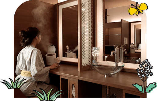 女性脱衣所の美容コーナー。保湿美顔器を完備し、お肌のケアをサポート